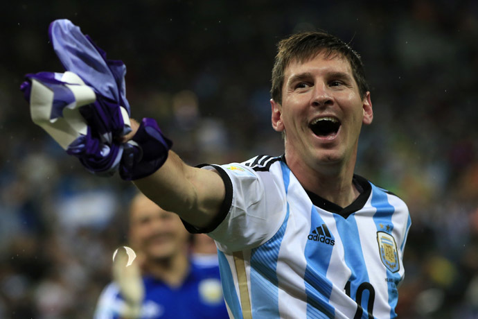 Argentina's forward and captain Lionel Messi celebrates his team's victory at the end of the semi-final football match between Netherlands and Argentina of the FIFA World Cup at The Corinthians Arena in Sao Paulo on July 9, 2014. (AFP Photo/Andrian Dennis)