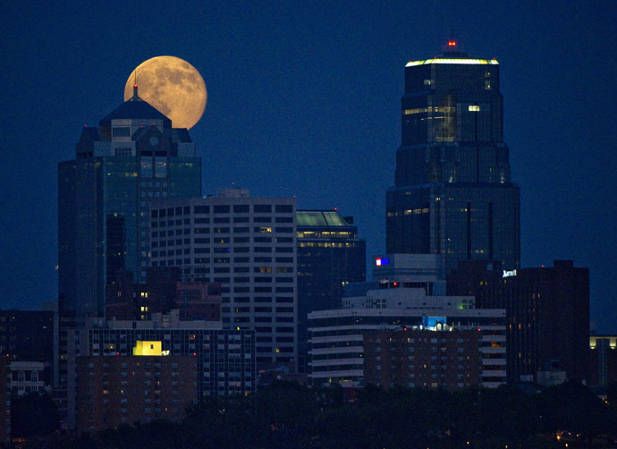 The Supermoon rises over downtown Kansas City, Missouri July 12, 2014. (Reuters/Dave Kaup)