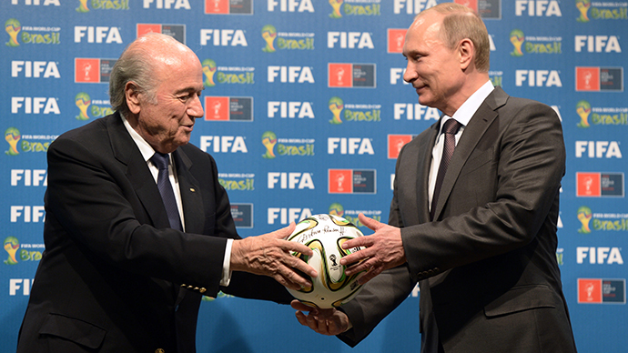 Russian President Vladimir Putin, right, and FIFA president Joseph Blatter during the official ceremony of handing over the 2018 World Cup signed certificate to Russia, July 13, 2014. (RIA Novosti / Aleksey Nikolskyi)