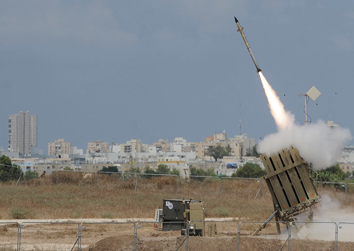A missile is launched by an "Iron Dome" battery, a short-range missile defence system designed to intercept and destroy incoming short-range rockets and artillery shells, on July 15, 2014 in the southern Israeli city of Ashdod. (AFP Photo / David Buimovitch) 