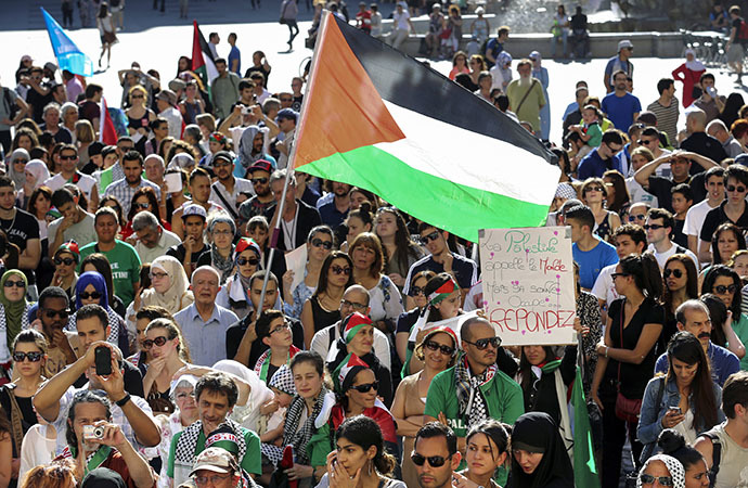 People protest on July 16, 2014 in the central French city of Lyon against Israel's deadly bombing of Gaza. (AFP Photo / Philippe Merle)