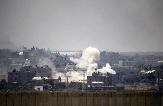 Smoke is seen after an Israeli strike over the Gaza Strip July 22, 2014. (Reuters/Baz Ratner)