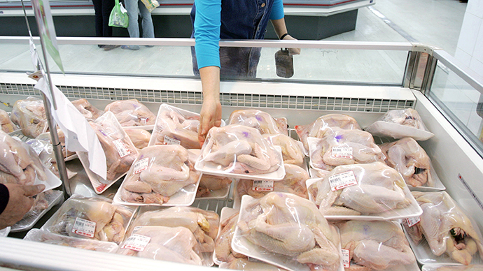 Damning allegations uncovered by a five-month Guardian investigation have prompted Sainsburyâs, Marks & Spencer and Tesco to establish high priority investigations into their chicken suppliers.(AFP Photo / Hoang Dinh Nam)