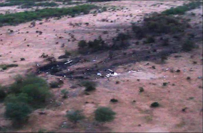 A handout photo released on July 25, 2014 by ECPAD shows the wreckage and debris of the Air Algerie flight AH5017 which crashed in Mali's Gossi region, west of Gao. (AFP Photo)