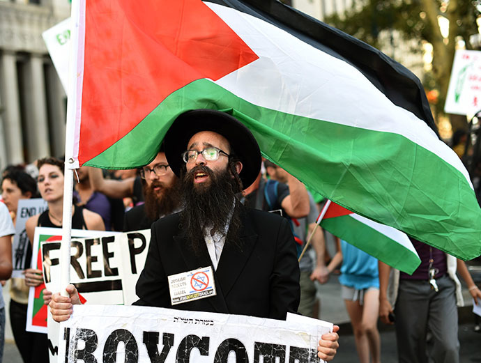 New Yorkers gather to protest IsraelÃ­s military assault in Gaza during a rally at Foley Square July 24, 2014 where they will read aloud over hundred names of the Palestinian children that killed in IsraelÃ­s assault, before march through lower Manhattan. (AFP Photo / Timothy A. Clary)