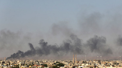 War planes bombard Libyan capital as Islamists seize control of Tripoli and airport (PHOTOS)