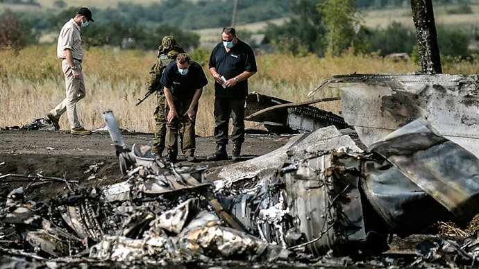 Dutch PM tells Ukraine to stop fighting near MH17 crash site