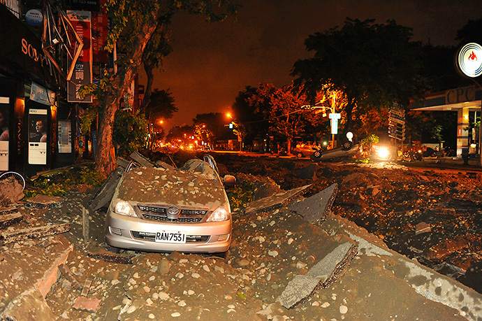 Wreckage of a damaged car is pictured after an explosion in Kaohsiung, southern Taiwan, August 1, 2014. (Reuters / Stringer)
