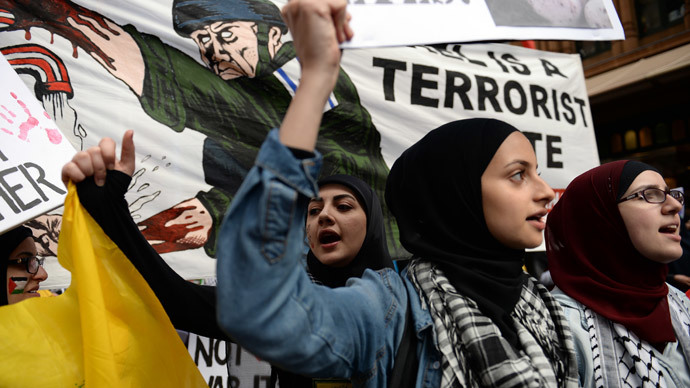 Protesters march in a rally in Sydney against Israel's military campaign in Gaza on August 3, 2014.(AFP Photo / Saeed Khan)