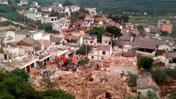 A general view shows collapsed houses after an earthquake hit Ludian county, Yunnan province August 3, 2014.(Reuters / China Daily)