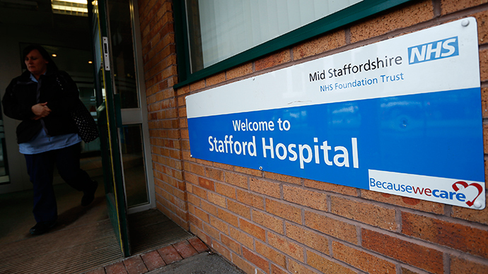 A woman leaves the Stafford Hospital in central England (Reuters / Darren Staples)