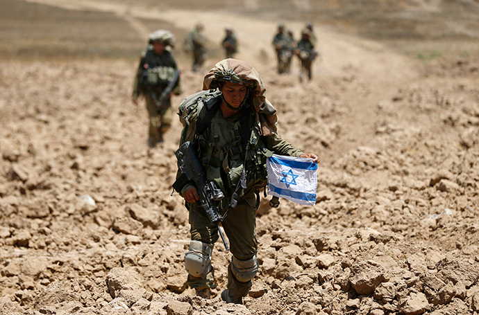 Israeli soldiers from the Givati brigade return to Israel from Gaza August 3, 2014 (Reuters / Baz Ratner)