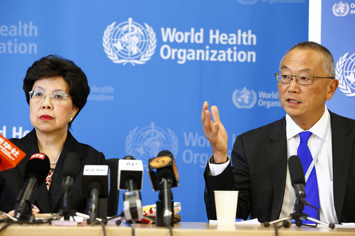 World Health Organization (WHO) Director-General Margaret Chan (L) sits next to Keiji Fukuda, WHO's assistant director general for health security, as he addresses the media after a two-day meeting of its emergency committee on Ebola, in Geneva August 8, 2014. (Reuters/Pierre Albouy)