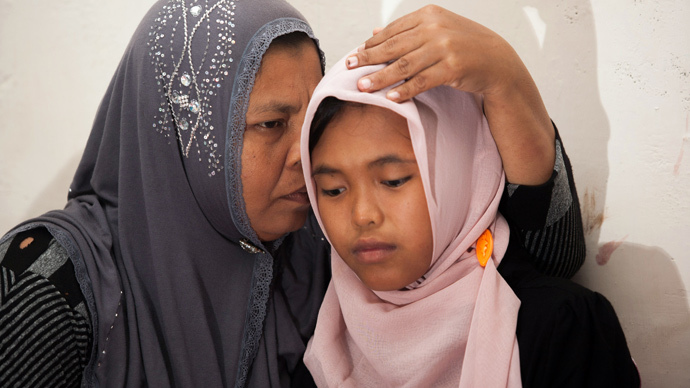'It's a miracle': Indonesian girl missing after 2004 tsunami reunites with family