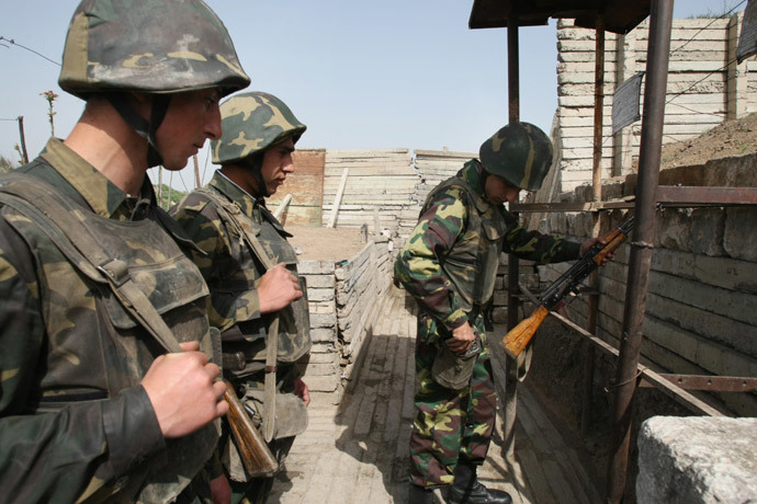 Firearms loading before sentry duty in Nagorno-Karabakh.(RIA Novosti / Iliya Pitalev)