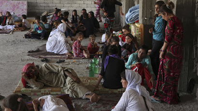 Islamic State admits, justifies enslaving Yazidi women and children