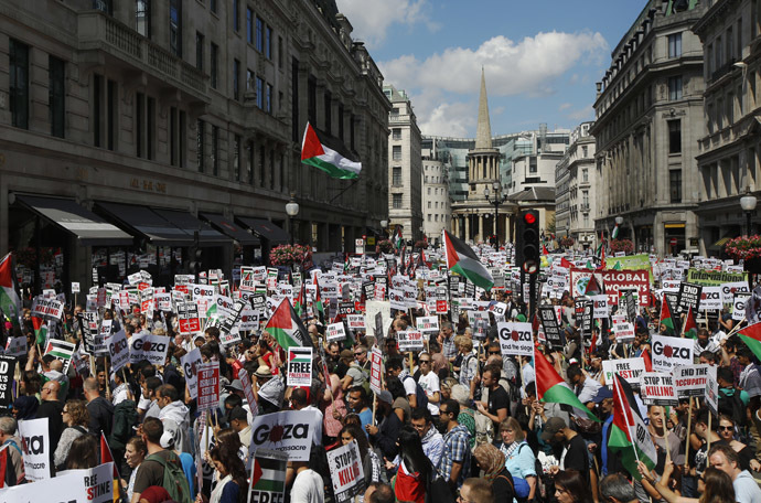 Demonstrators join a rally to support the people of Gaza, in central London August 9, 2014. (Reuters/Luke MacGregor)
