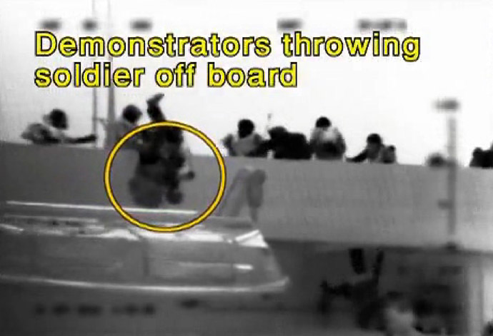  An image grab taken from a video released by the Israeli navy shows, according to the Israeli military, passengers of Turkish aid ship Mavi Marmara, one of the ships in the "Freedom Flotilla", throwing an Israeli soldier off board on May 31, 2010 during a pre-dawn assault in international waters which killed several pro-Palestinian activists and sparked global outrage, plunging the Jewish state into a diplomatic crisis. (AFP/IDF)