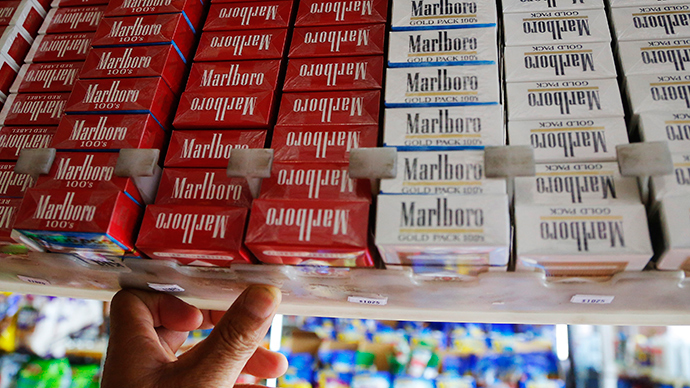 Big tobacco fuming: Philip Morris threatens to sue over plain cigarette packaging