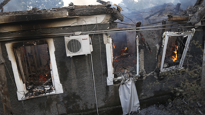 A house burnt during artillery bombardment in Donetsk. (RIA Novosti / Maks Vetrov)