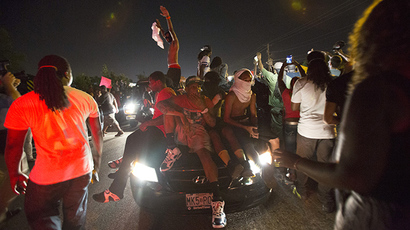 'Fighting effects of tear gas': Amnesty says Ferguson cops violate basic human rights