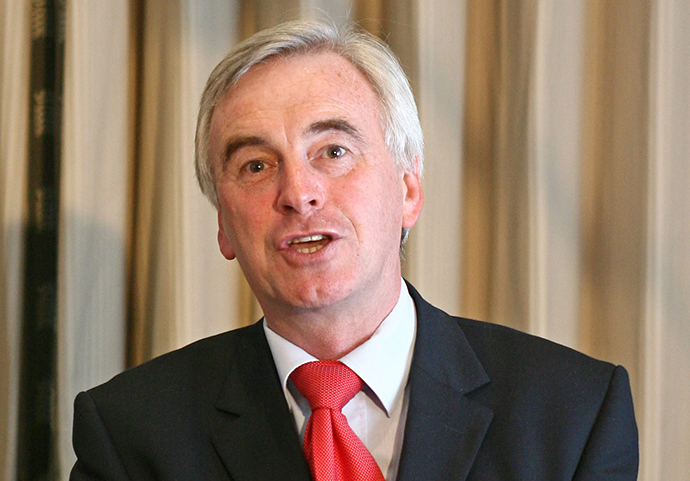 The UK government has, in all likelihood, presided over the export of arms to Israel used to âslaughter innocent civilians on the Gaza Stripâ, Labour MP John McDonnell warns. (AFP Photo / Chris Young)