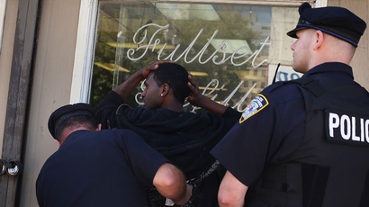 One shot, 7 arrested as Ferguson police disperse protesters defying curfew