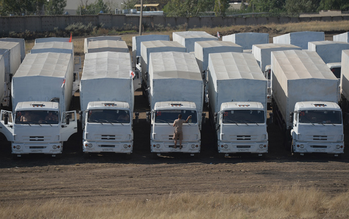 A convoy of Kamaz trucks carrying humanitarian aid for people in southeastern Ukraine in a rest area not far from Kamensk-Shakhtinsky in the Rostov Region. (RIA Novosti / Maksim Blinov) 