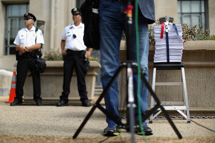 A 4000-page petition with 100,000 signatories who support New York Times reporter James Risen sits on a step ladder before being delivered to the U.S. Justice Department August 14, 2014 in Washington, DC. (AFP Photo / Chip Somodevilla)