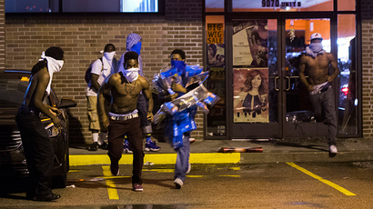 Indefinite curfew: Ferguson police deploy tear gas against protesters