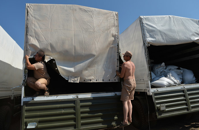 A convoy of Kamaz trucks carrying humanitarian aid for people in southeastern Ukraine in a rest area not far from Kamensk-Shakhtinsky in the Rostov Region. (RIA Novosti/Maksim Blinov)