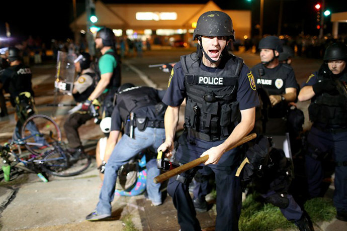 Police officers arrest a demonstrator on August 18, 2014 in Ferguson, Missouri. (AFP Photo / Getty Images / Joe Raedle)