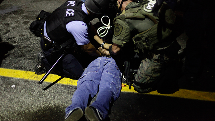 Nearly four-dozen arrested in Ferguson on eve of attorney general’s visit