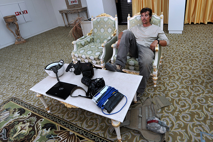 File picture taken September 29, 2011 shows US freelance reporter James Foley resting in a room at the airport of Sirte, Libya (AFP Photo)