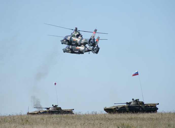 ARCHIVE PHOTO: Chinese Z9B helicopters and Russian BMP-2 vehicles during practical training held as part of the Peace Mission 2013, a Russia-China joint anti-terrorism drill, at the Chebarkul firing range. (RIA Novosti / Pavel Lisitsyn)