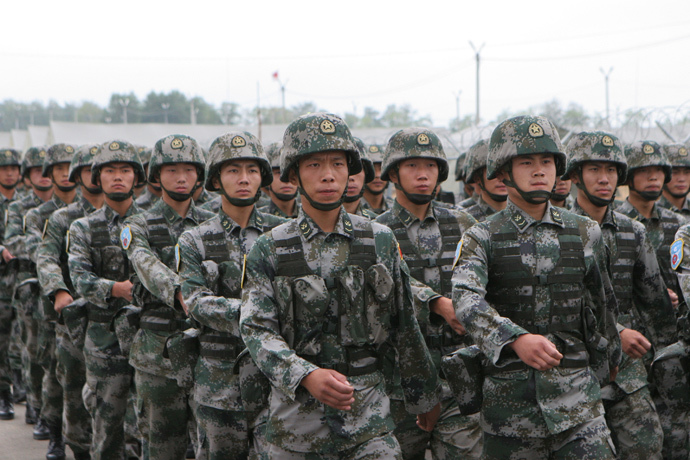 ARCHIVE PHOTO: Soldiers of the ground force units of the People's Liberation Army (PLA) of China march after their arrival in Chebarkul, Chelyabinsk Region, for the joint Russian-Chinese anti-terrorism military exercises "Peace Mission 2013". (RIA Novosti / Vladislav Belogrud) 