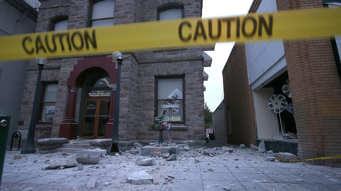 Debris sits on the ground in front of a damaged building following a reported 6.0 earthquake on August 24, 2014 in Napa, California.(AFP Photo / Justin Sullivan)