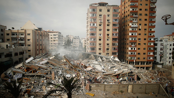 A general view of the rubble of a residential tower, which witnesses said was destroyed in an Israeli air strike, is seen in Gaza City August 24, 2014 (Reuters / Mohammed Salem)