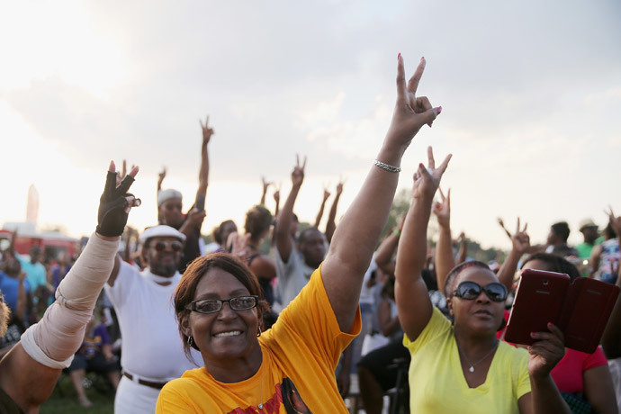 People attend the Peace Fest music festival in Forest Park on August 24, 2014 in St. Louis, Missouri. (AFP Photo / Scott Olson)