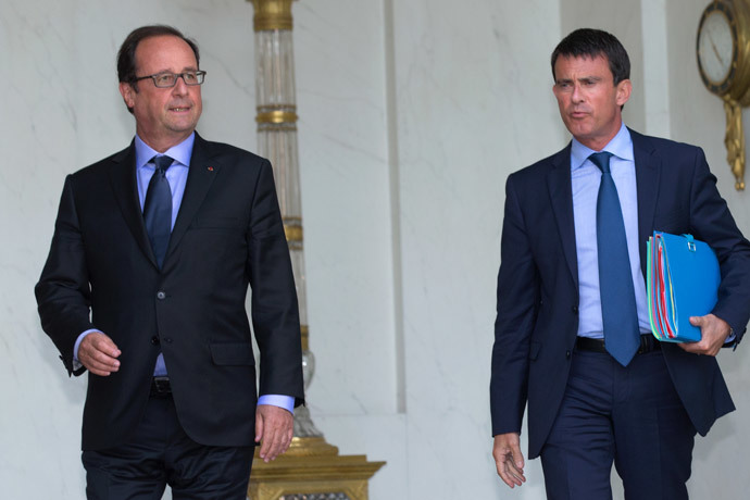 French President Francois Hollande and Prime Minister Manuel Valls.(Reuters / Philippe Wojazer)