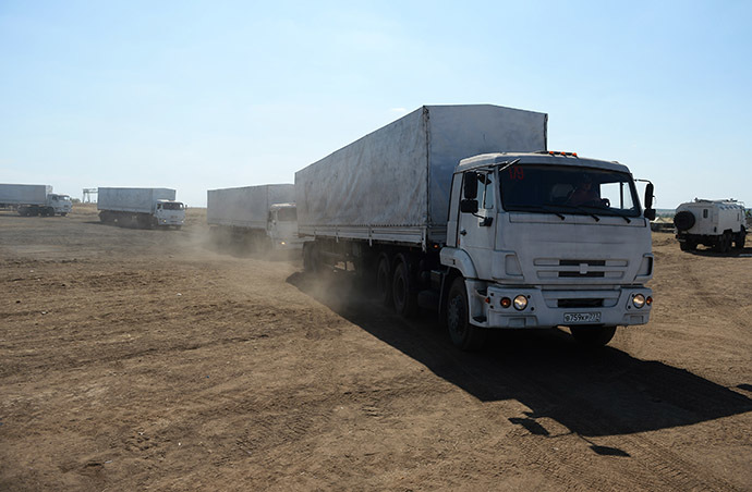 A column of KamAZ trucks that delivered humanitarian aid to Lugnask leaves the Rostov region towards the Moscow region. (RIA Novosti / Maksim Blinov)