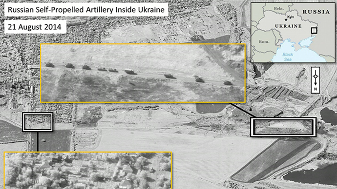 A handout photo provided on August 28, 2014 by DigitalGlobe via NATO allegedly shows Russian military units moving in a convoy formation with self-propelled artillery in the area of Krasnodon, Ukraine (AFP Photo / HO / DigitalGlobe) 