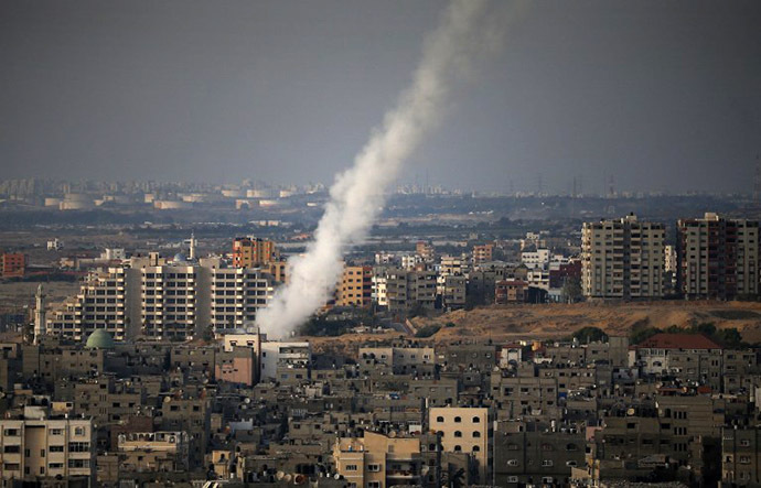 A picture taken from Gaza city shows the smoke that results from the launch of a long-range rocket from the north of the city towards Israel on July 12, 2014 following an advance warning of the attack by Ezzedine al-Qassam Brigades, the military wing of Hamas. (AFP Photo / Thomas Coex)