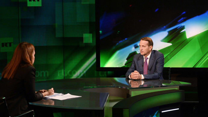 State Duma Speaker Sergey Naryshkin and RT's correspondent Madina Kochenova at RT on August 30, 2014 (Image by RIA Novosti)