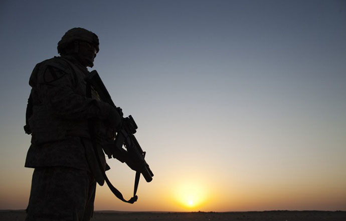 FILE photo. US Specialist from the 3rd Brigade Combat Team, 1st Cavalry Division secures the perimeter outside of a Mine Resistant Ambush Protected (MRAP) vehicle. (AFP Photo / Lucas Jackson)