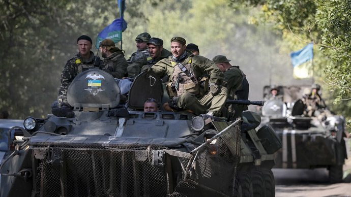 Ukrainian paratroopers ride in armoured vehicles near Kramatorsk September 4, 2014. (Reuters/Gleb Garanich)