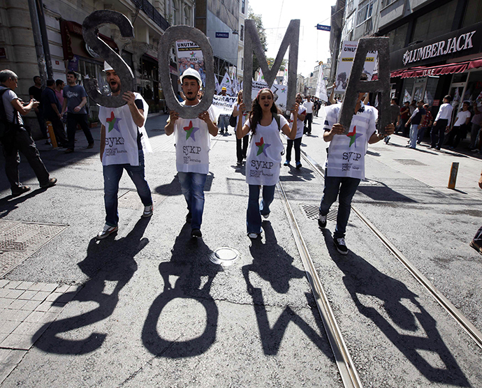 Protesters demonstrate against poor work safety after an accident killed ten workers at a construction site, in central Istanbul September 7, 2014. (Reuters / Osman Orsal)