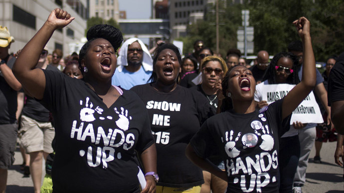 Redskins defense run out with their hands up in tribute to slain Ferguson  teenage Michael Brown