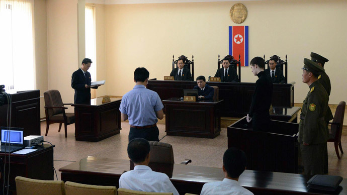 U.S. citizen Matthew Todd Miller (4th R) stands in a witness box during his trial at the North Korean Supreme Court in this undated photo released by North Korea's Korean Central News Agency (KCNA) in Pyongyang September 14, 2014.(Reuters / KCNA)
