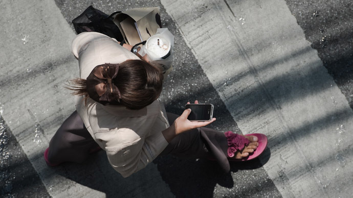 Smartphone separation: Chinese city creates special sidewalk lane for cell phone users